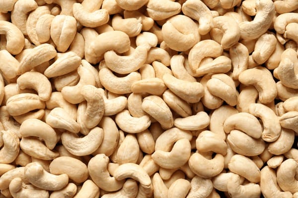 tasty-cashew-nuts-background-top-600nw-1268855638.jpg